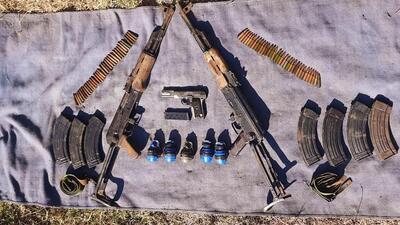 The seizure included two AK assault rifles, seven AK magazines, a pistol, five Chinese grenades and 69 rounds of ammunition. (ANI)
