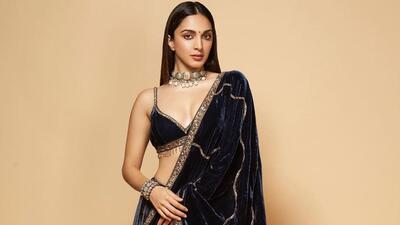 Kiara Advani looks ethereal in a dark blue velvet lehenga by Sureena Chowdhri (Photo: Instagram) Kiara Advani looks ethereal in a dark blue velvet lehenga by Sureena Chowdhri (Photo: Instagram)