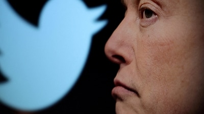 Elon Musk: Twitter logo and a photo of Elon Musk are seen. (Reuters)