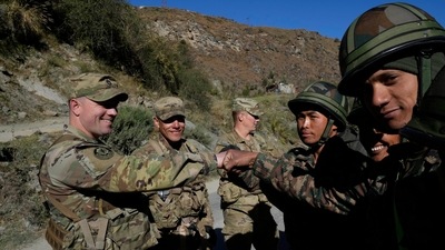 A light-hearted moment showing the soldiers giving fist ups. (AP) A light-hearted moment showing the soldiers giving fist ups. (AP)