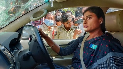 YSR Telangana Party chief YS Sharmila on her way to the residence of Telangana chief minister K Chandrashekar Rao in Hyderabad on Monday, (PTI)