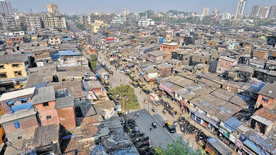 Dharavi sits on 240 hectares of prime land in the heart of Mumbai and its redevelopment, first proposed formally by the then Congress chief minister Sushil Kumar Shinde in 2004, involves rehabilitation of more than 60,000 families and 13,000 commercial units in tenements of 405 sq ft. (Satish Bate/HT PHOTO) Dharavi sits on 240 hectares of prime land in the heart of Mumbai and its redevelopment, first proposed formally by the then Congress chief minister Sushil Kumar Shinde in 2004, involves rehabilitation of more than 60,000 families and 13,000 commercial units in tenements of 405 sq ft. (Satish Bate/HT PHOTO)
