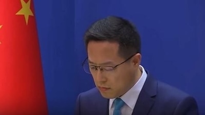 China foreign ministry spokesperson Zhao Lijian continued looking at the papers in front of him for almost 20 seconds.