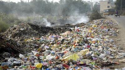 Garbage on a road near Govindpuram God Home Society in Ghaziabad on Wednesday. (Sakib Ali/HT Photo)