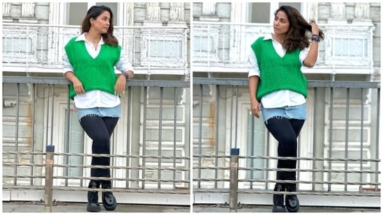 Hina wore a crisp white shirt, a knit green cardigan, a distressed denim skirt, and black tights for her visit to Arnavutköy. She styled the ensemble with a bracelet, a digital watch, combat boots, open tresses, and a no-makeup look.(Instagram)