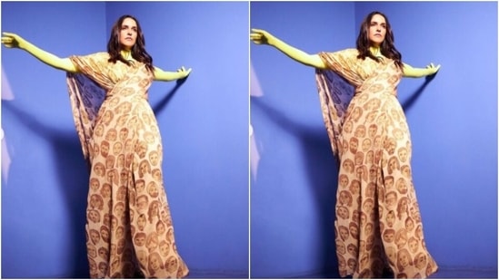 Neha decked up in a beige satin jumpsuit with faces printed on it. Neha teamed it with a neon yellow turtle neck top.(Instagram/@nehadhupia)