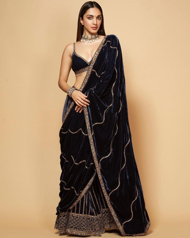 Kiara Advani looks ethereal in a dark blue velvet lehenga by Sureena Chowdhri (Photo: Instagram) Kiara Advani looks ethereal in a dark blue velvet lehenga by Sureena Chowdhri (Photo: Instagram)