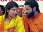 Indian cricketer Ravindra Jadeja interacts with his wife and Bharatiya Janata Party (BJP) candidate from Jamnagar (North) seat. (ANI)