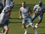 England's captain Ben Stokes (2R) warms up along with teammates during a training session ahead of their first cricket Test match against Pakistan, at the Rawalpindi Cricket Stadium in Rawalpindi on November 28, 2022. (Photo by Aamir QURESHI / AFP) England's captain Ben Stokes (2R) warms up along with teammates during a training session ahead of their first cricket Test match against Pakistan, at the Rawalpindi Cricket Stadium in Rawalpindi on November 28, 2022. (Photo by Aamir QURESHI / AFP)