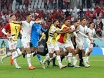 Morocco's players celebrate winning the FIFA World Cup Group F match against Canada(AFP) Morocco's players celebrate winning the FIFA World Cup Group F match against Canada(AFP)