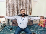 Moustache man Maganbhai Solanki, an independent candidate contesting from Himmatnagar seat in Sabarkantha district in Gujarat. (PTI)