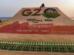 Pattnaik displayed the logo and its theme at the International Sand Art Festival in Konark in Odisha. (PTI photo) Pattnaik displayed the logo and its theme at the International Sand Art Festival in Konark in Odisha. (PTI photo)