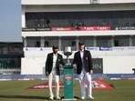 Pakistan captain Babar Azam and England skipper Ben Stokes pose with the trophy Pakistan captain Babar Azam and England skipper Ben Stokes pose with the trophy