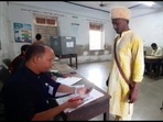 Gujarat election: Prafulbhai More, a voter, claims to have rescheduled his wedding as he appeared to cast his vote in Tapi, Thursday.(ANI)
