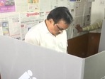 Gujarat BJP chief CR Paatil casts his vote in Surat.(ANI)