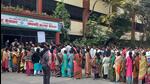 People waiting to vote outside a polling station in Surat. (AFP)