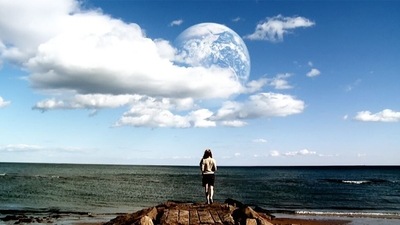Another Earth (2011): A promising MIT astrophysicist, Rhoda Williams (Brit Marling), distracted by the appearance of another Earth in the night sky, crashes her car, causing a musician to lose his pregnant wife and lapse into a coma. Haunted by guilt and regret, Williams travels to another version of Earth where the accident never occurred. (Image Courtesy: Artists Public Domain) Another Earth (2011): A promising MIT astrophysicist, Rhoda Williams (Brit Marling), distracted by the appearance of another Earth in the night sky, crashes her car, causing a musician to lose his pregnant wife and lapse into a coma. Haunted by guilt and regret, Williams travels to another version of Earth where the accident never occurred. (Image Courtesy: Artists Public Domain)