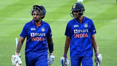 India's Suryakumar Yadav, left, and Shubman Gill leave the field during a rain delay during their one day international cricket match in Hamilton, New Zealand, Sunday, Nov. 27, 2022. (Andrew Cornaga/Photosport via AP) (AP)