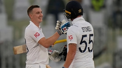 England's Harry Brook, left, is congratulated by teammate Ben Stokes after scoring century during the first day of the first test cricket match between Pakistan and England, in Rawalpindi, Pakistan, Dec. 1, 2022. (AP Photo/Anjum Naveed) (AP) England's Harry Brook, left, is congratulated by teammate Ben Stokes after scoring century during the first day of the first test cricket match between Pakistan and England, in Rawalpindi, Pakistan, Dec. 1, 2022. (AP Photo/Anjum Naveed) (AP)