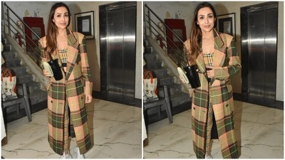 Malaika Arora looks stunning in a co-ord check bralette, leggings and long coat. (HT Photo/Varinder Chawla) Malaika Arora looks stunning in a co-ord check bralette, leggings and long coat. (HT Photo/Varinder Chawla)