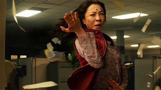 Everything Everywhere All At Once&nbsp;(2022): The movie explores the many dimensions of parenthood and love through the story of a Chinese-American immigrant named Evelyn Wang (played by Michelle Yeoh) who, while struggling to run a failing laundromat business, uses her newfound powers to travel across multiple realities to save the world and work on her strained relationships with her loved ones. It’s a family drama that’s fast-paced, funny and, above all, tackles earnestly the idea of healing from intergenerational trauma.(Image Courtesy: A24 )