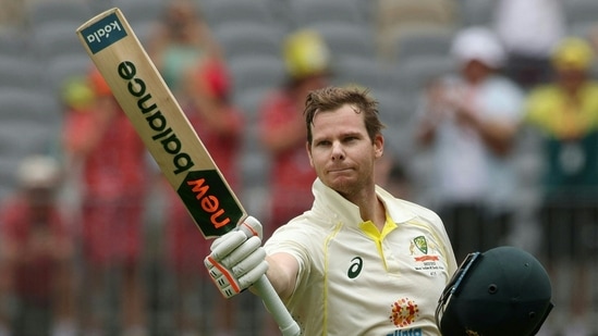 Steve Smith of Australia reacts after getting his century during the 2nd day of the first Test cricket match between Australia and the West Indies at Perth Stadium on December 1 2022. (Photo by COLIN MURTY / AFP) / -- IMAGE RESTRICTED TO EDITORIAL USE - STRICTLY NO COMMERCIAL USE --(AFP)