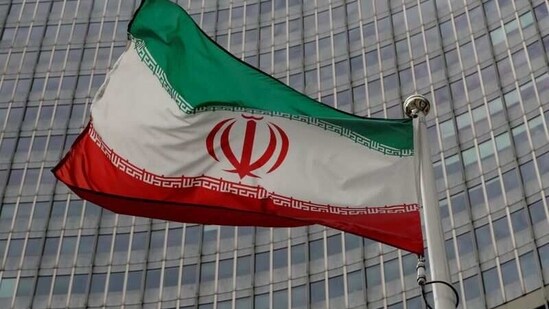 An Iranian flag flutters in front of the International Atomic Energy Agency (IAEA) headquarters in Vienna, Austria.(REUTERS file)