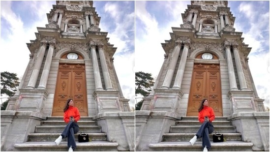 Hina Khan shares snippets of enjoyable diaries in Turkey, slays journey style objectives 6 Hina teamed her bright orange sweater with a pair of black denims with wide legs.(Instagram/@realhinakhan)