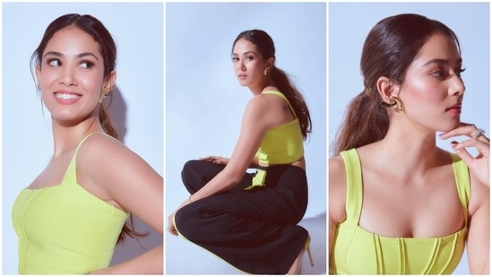 Mira Rajput dons a neon green crop top and flared pants. (Instagram)