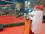 Gujarat Assembly election 2022: Union Home Minister Amit Shah greets supporters during a public meeting in Ahmedabad. (Twitter/Amit Shah via ANI)