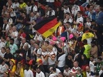 Germany supporters react at the end of the Qatar 2022 World Cup Group E football match between Costa Rica and Germany at the Al-Bayt Stadium in Al Khor, north of Doha on December 1, 2022. (Photo by FRANCK FIFE / AFP)(AFP) Germany supporters react at the end of the Qatar 2022 World Cup Group E football match between Costa Rica and Germany at the Al-Bayt Stadium in Al Khor, north of Doha on December 1, 2022. (Photo by FRANCK FIFE / AFP)(AFP)