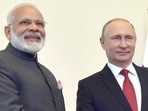 Prime Minister Narendra Modi shakes hands with Russian President Vladimir Putin. Prime Minister Narendra Modi shakes hands with Russian President Vladimir Putin.