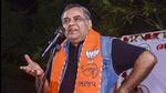 Surat: Bollywood actor and former BJP MP Paresh Rawal addresses an election campaign rally for the Gujarat Assembly elections, in Surat on Monday (PTI Photo)