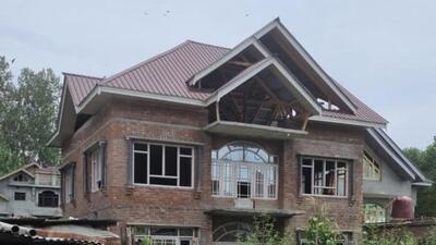 One of the four houses that sheltered terrorists, which is being attached by the authorities. (ANI/Twitter)