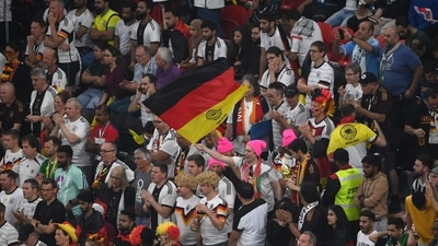 Germany supporters react at the end of the Qatar 2022 World Cup Group E football match between Costa Rica and Germany at the Al-Bayt Stadium in Al Khor, north of Doha on December 1, 2022. (Photo by FRANCK FIFE / AFP) (AFP) Germany supporters react at the end of the Qatar 2022 World Cup Group E football match between Costa Rica and Germany at the Al-Bayt Stadium in Al Khor, north of Doha on December 1, 2022. (Photo by FRANCK FIFE / AFP) (AFP)