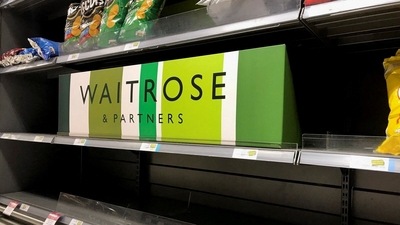 Empty crisp shelves are pictured at Waitrose supermarket. (REUTERS)
