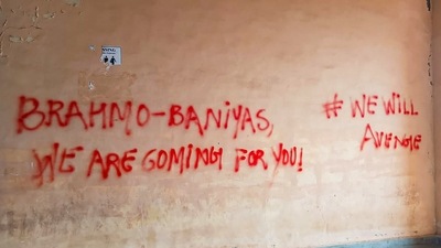 Walls of JNU defaced with anti-Brahmin slogans in New Delhi. (PTI) Walls of JNU defaced with anti-Brahmin slogans in New Delhi. (PTI)