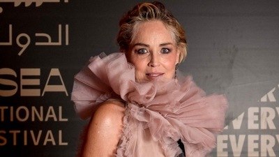 Veteran Hollywood actor Sharon Stone arriving on the red carpet during the opening ceremony of Red Sea Film International Festival. (AFP) Veteran Hollywood actor Sharon Stone arriving on the red carpet during the opening ceremony of Red Sea Film International Festival. (AFP)