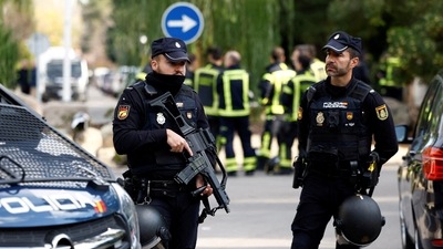 Police stands outside of Ukrainian embassy in Madrid, Spain. (Reuters)