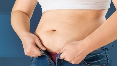 8. Abdominal swelling: You will have a tough time due to abdominal swelling and that can indicate stomach cancer. So, be attentive when it comes to your health. Do not ignore these symptoms at all. (Shutterstock) 8. Abdominal swelling: You will have a tough time due to abdominal swelling and that can indicate stomach cancer. So, be attentive when it comes to your health. Do not ignore these symptoms at all. (Shutterstock)