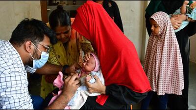 Mumbai, India - December 02, 2022: A healthcare worker administers a vaccine to a child at a temporary vaccination camp following measles outbreak, at Dharavi, in Mumbai, India, on Friday, December 02, 2022. (Photo by Bhushan Koyande/HT Photo) (HT PHOTO) Mumbai, India - December 02, 2022: A healthcare worker administers a vaccine to a child at a temporary vaccination camp following measles outbreak, at Dharavi, in Mumbai, India, on Friday, December 02, 2022. (Photo by Bhushan Koyande/HT Photo) (HT PHOTO)