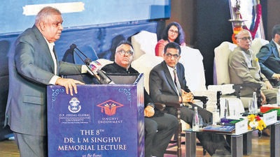 New Delhi, India - Dec. 2, 2022: Vice President Jagdeep Dhankar speaks while Justice D.Y. Chandrachud, Chief Justice, and others on the dais, looks on during the 8th Dr. L M Singhvi Memorial Lecture on the theme “Universal Adult Franchise: Translating India’s Political Transformation into a Social Transformation” at Ambedkar Bhawan in New Delhi, India, on Friday, December 2, 2022. (Photo by Vipin Kumar/ Hindustan Times) (Hindustan Times) New Delhi, India - Dec. 2, 2022: Vice President Jagdeep Dhankar speaks while Justice D.Y. Chandrachud, Chief Justice, and others on the dais, looks on during the 8th Dr. L M Singhvi Memorial Lecture on the theme “Universal Adult Franchise: Translating India’s Political Transformation into a Social Transformation” at Ambedkar Bhawan in New Delhi, India, on Friday, December 2, 2022. (Photo by Vipin Kumar/ Hindustan Times) (Hindustan Times)