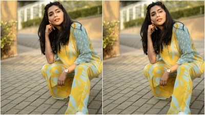 Aishwarya looked too glam to give a damn in this yellow and blue satin co-ord set as she slayed casual fashion for her fans. (Instagram/@aishu__)