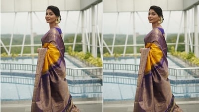 Aishwarya looked like the epitome of grace in a yellow and blue kanjivaram saree with white flowers tucked into her bun. (Instagram/@aishu__)