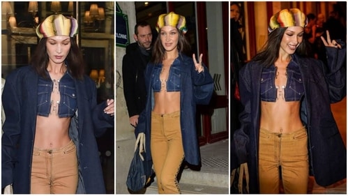 Bella Hadid, was seen wearing a cropped denim top that featured a handful of silver safety pins crisscrossed, topped off with an oversized denim blazer and teamed with mid-rise tan pants. (Instagram) Bella Hadid, was seen wearing a cropped denim top that featured a handful of silver safety pins crisscrossed, topped off with an oversized denim blazer and teamed with mid-rise tan pants. (Instagram)