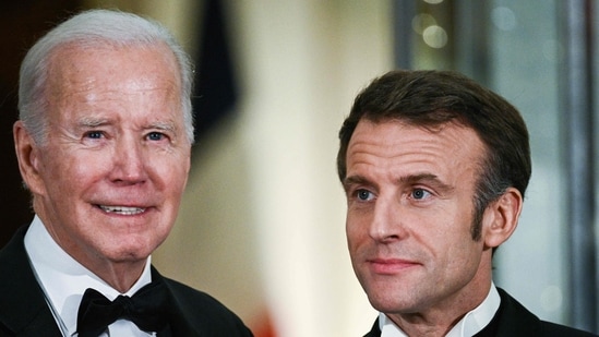 Joe Biden-Emmanuel Macron: US President Joe Biden and France's President Emmanuel Macron talk at the White House.(AFP)