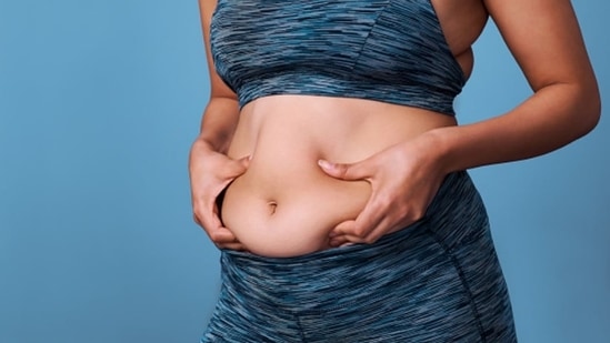 1. The stomach bulges out: If you have stomach cancer then you may end up feeling full. This cancer will spread to the coating of the abdomen, causing liquid collection inside your stomach. It can prompt extreme bulging and you will look as if you are carrying the baby.&nbsp;(Unsplash)