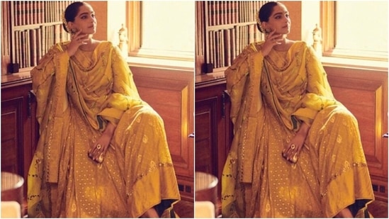 Sonam donned a yellow anarkali shirt with gold resham lace details all over the body.  She also paired it with a yellow double top with wide hemline and gold resham embroidery details.(Instagram/@sonamkapoor)