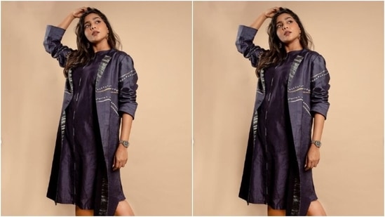 Here’s a picture of a sassy Aishwarya rocking the look in a dark blue satin short dress and layered with a blue satin shrug.(Instagram/@aishu__)