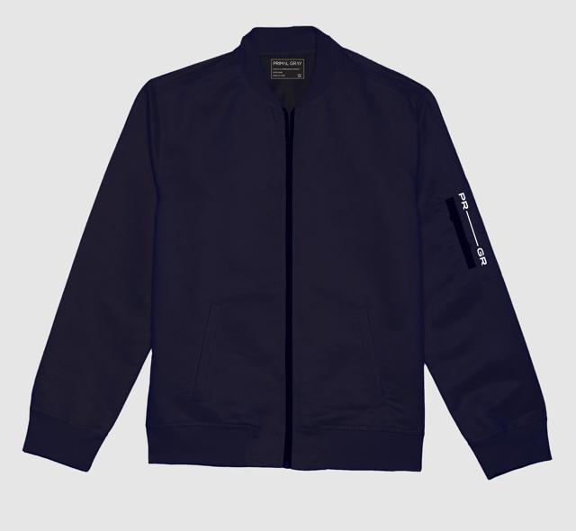 This smart, industrial inspired jacket with a flat ribbed collar and cuffs is a must have for every boy and man. (Oversize bomber jacket made with recycled PET and island silk by Primal Gray) This smart, industrial inspired jacket with a flat ribbed collar and cuffs is a must have for every boy and man. (Oversize bomber jacket made with recycled PET and island silk by Primal Gray)
